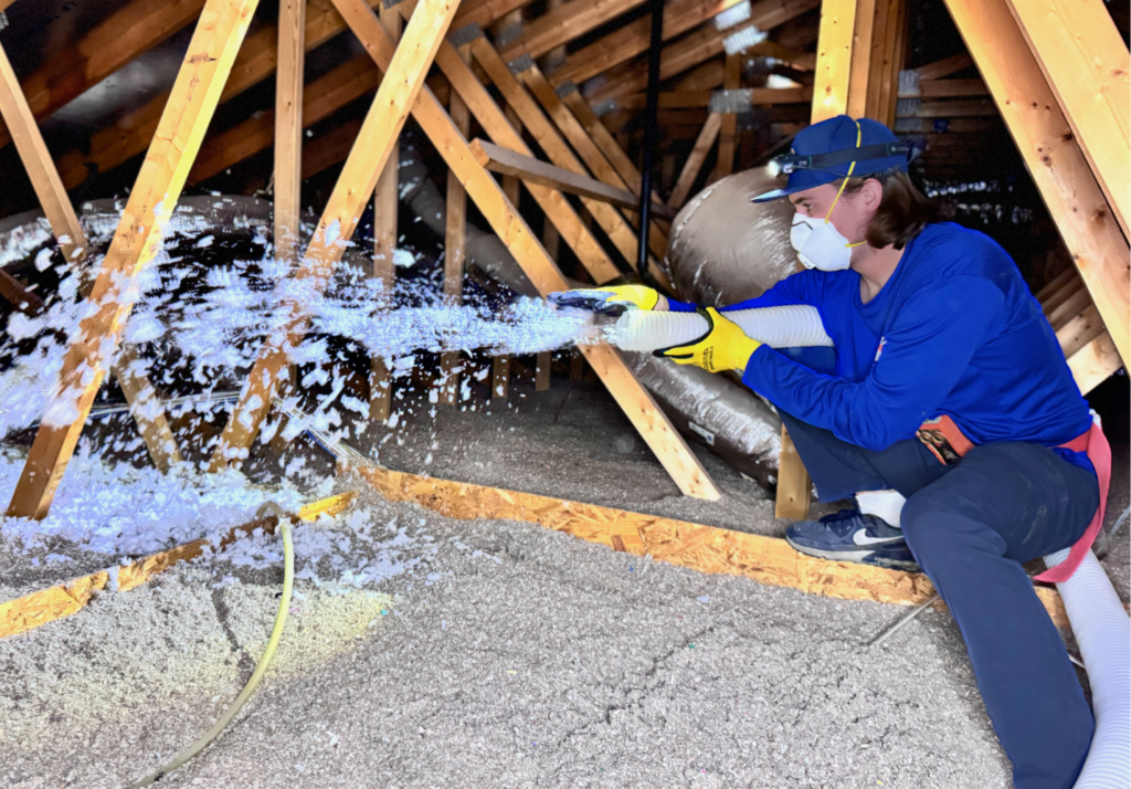 Mesa insulation team adding attic and wall insulation to lower energy costs year-round.