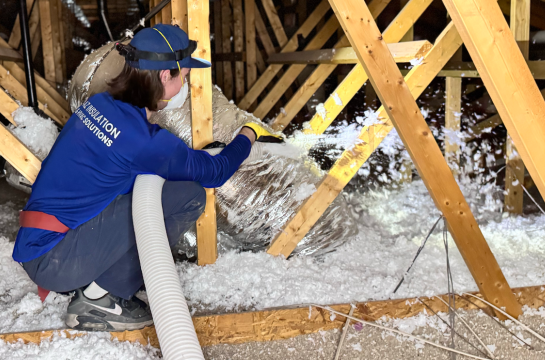 AZ Insulation & HVAC team installing attic insulation to meet Arizona code.