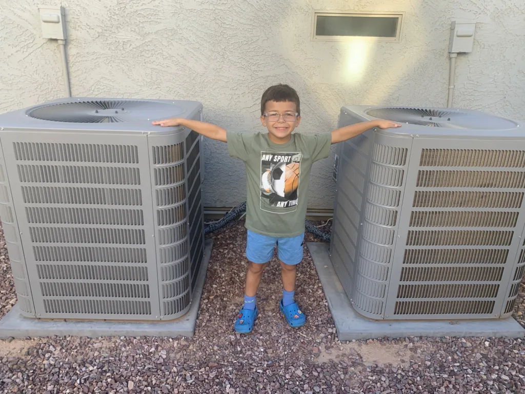 Local foster home receiving free blown-in insulation and energy-efficient HVAC system.