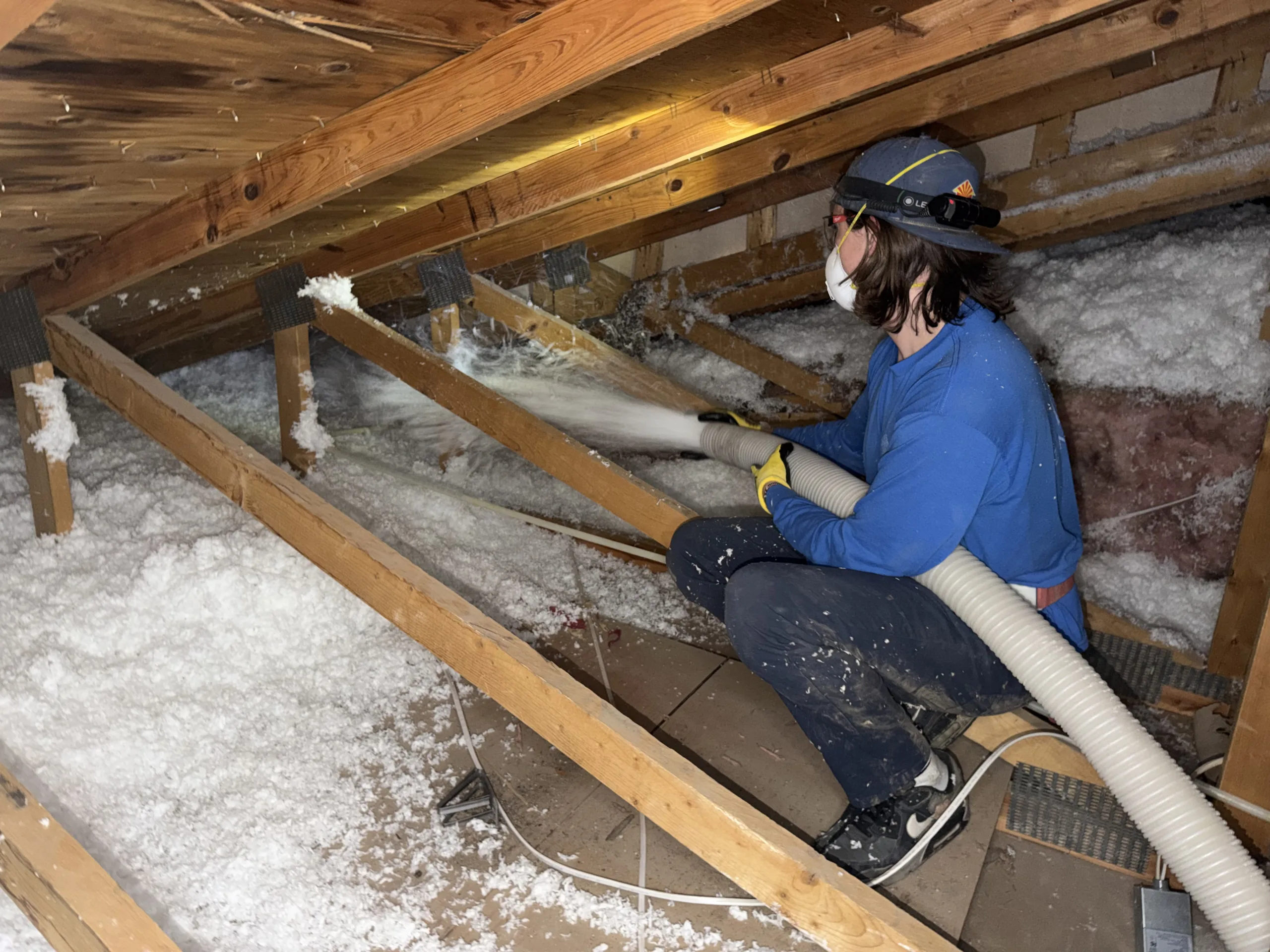 AZ Insulation & HVAC Solutions crew installing insulation and HVAC upgrades to improve home energy efficiency in Mesa, Arizona.