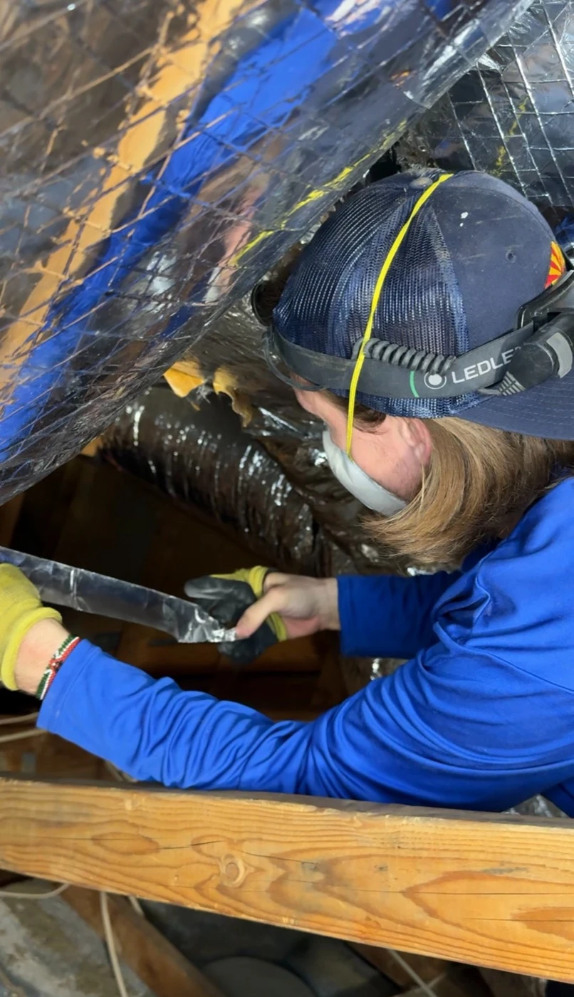 Ductwork installation and sealing in an Arizona home.