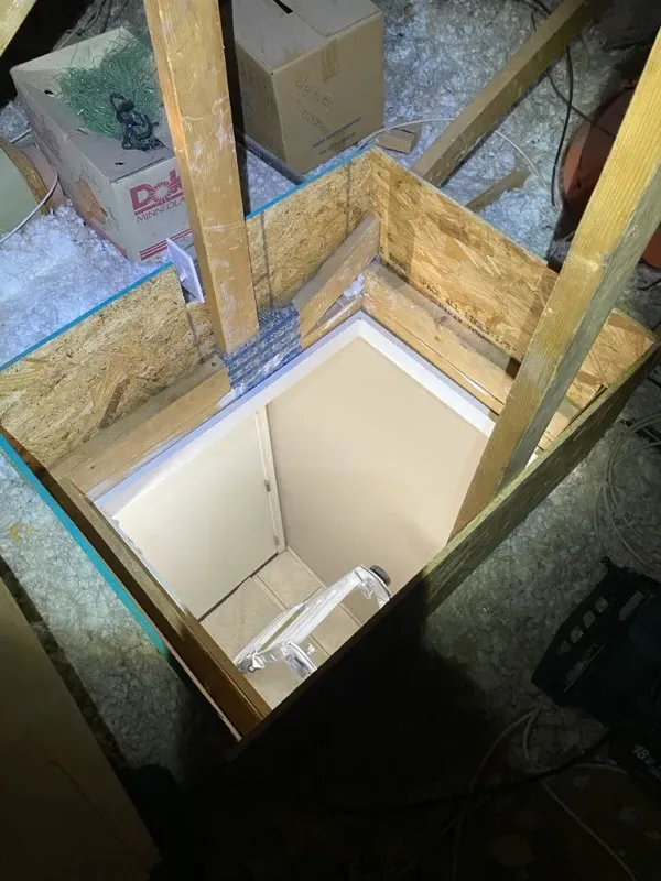 Insulated attic access dam framed around the attic hatch on a Phoenix home