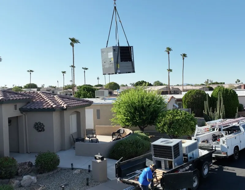 New rooftop packaged HVAC unit craned onto a Phoenix home