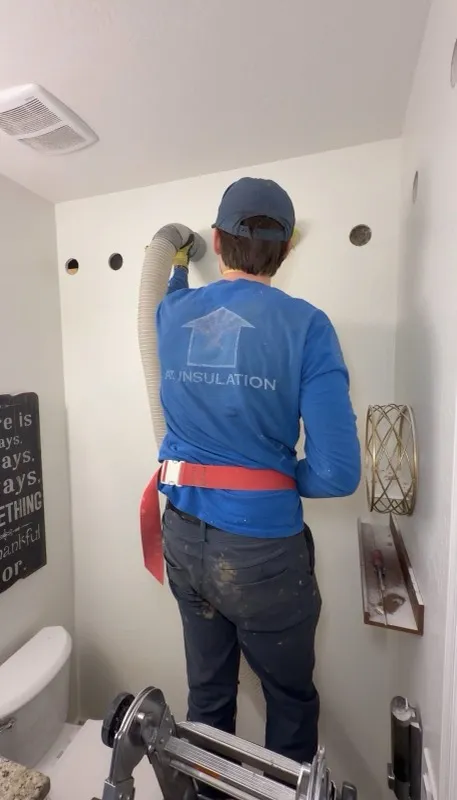 Sound-barrier drill-and-fill wall insulation in a Queen Creek home