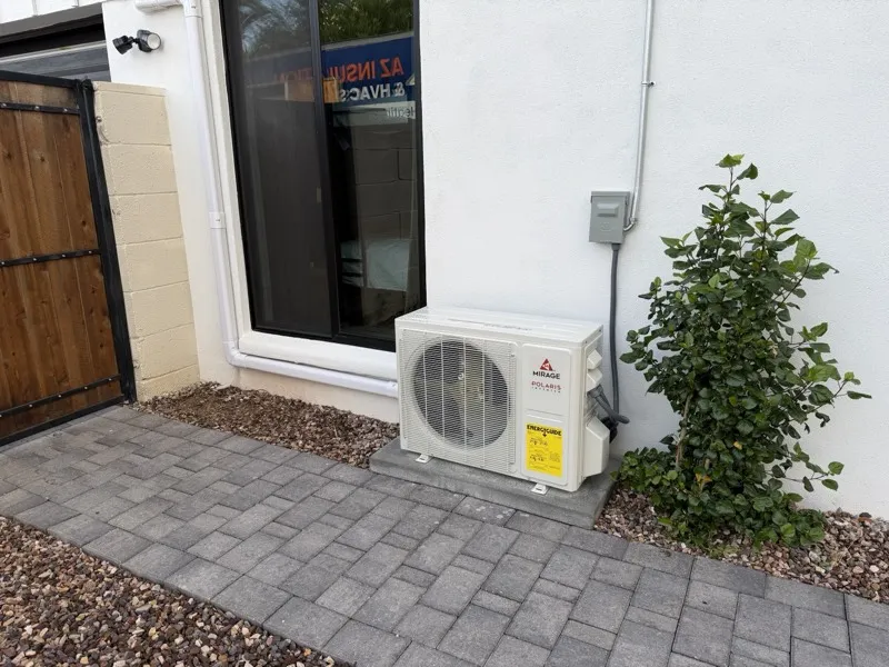 Mirage Polaris inverter mini-split condenser installed outside a Scottsdale bedroom