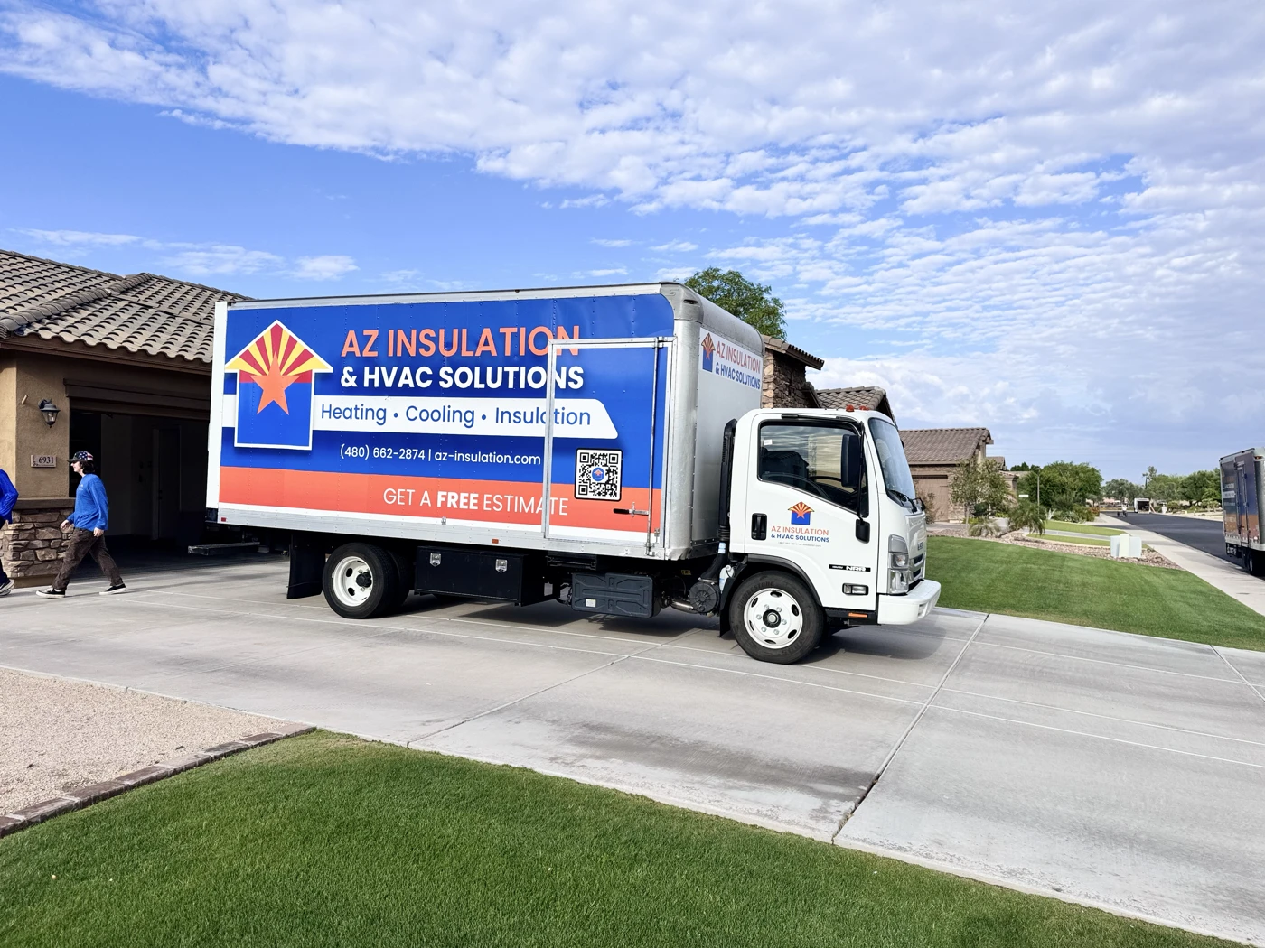 AZ Insulation & HVAC Solutions truck in an Arizona driveway for a free home-comfort estimate